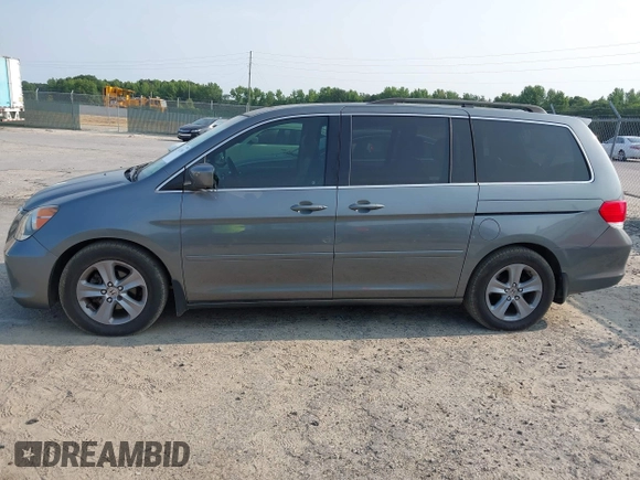 2008 Honda Odyssey Touring z VIN 5FNRL38978B047803, wystawiony jako IAAI lot #42427855 z przebiegiem 125 697 mil mil oraz . Historia ofert i sprzedaży dostępna na DreamBid. Obrazek 13.