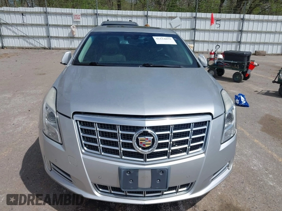2013 Cadillac XTS Luxury z VIN 2G61P5S3XD9178601, wystawiony jako IAAI lot #42154859 z przebiegiem 111 227 mil mil oraz . Historia ofert i sprzedaży dostępna na DreamBid. Obrazek 12.