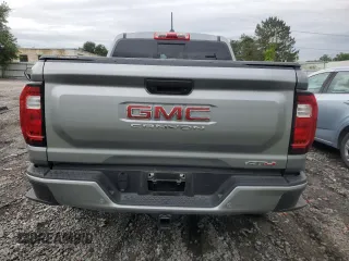 2023 GMC Canyon 4WD AT4 with VIN 1GTP6DEK4P1124937, listed as a Copart auction lot 66103474 with 10,566 mi miles and Salvage Title. Bid and sale history available at carsss.com. Image 6.