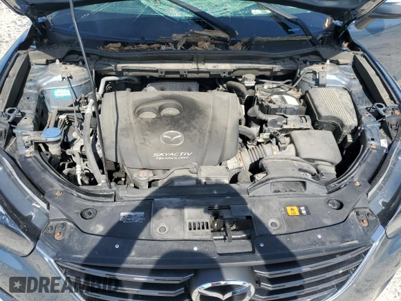 2016 Mazda CX-5 Sport with VIN JM3KE4BY8G0745522, listed as a Copart auction lot 56621825 with 98,757 mi miles and Salvage title. Bid and sale history available at DreamBid. Image 12.