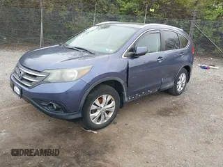 2014 Honda CR-V EX-L with VIN 5J6RM4H71EL092983, listed as a IAAI auction lot 42018356 with 136,024 mi miles. Bid and sale history available at carsss.com. Image 2.