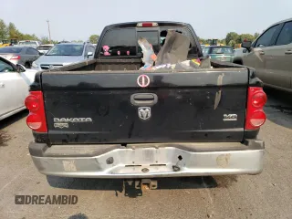 2005 Dodge Dakota Laramie with VIN 1D7HW58N65S161629, listed as a Copart auction lot 66570164 with 205,984 mi miles and Salvage Title. Bid and sale history available at carsss.com. Image 6.