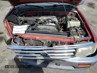 1996 Toyota T100 SR5 z VIN JT4TN14D7T0017707, wystawiony jako Copart lot #75676624 z przebiegiem 246 564 mil mil oraz Szkody całkowita. Historia ofert i sprzedaży dostępna na DreamBid. Obrazek 11.