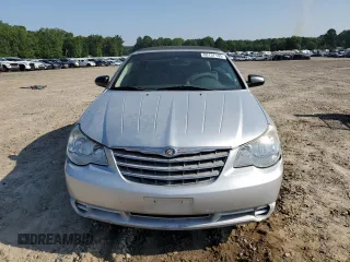 2008 Chrysler Sebring LX z VIN 1C3LC45K28N188707, wystawiony jako Copart lot #60137105 z przebiegiem 245 175 mil mil oraz Szkoda całkowita • Salvage title. Historia ofert i sprzedaży dostępna na DreamBid. Obrazek 5.