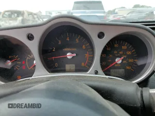 2003 Nissan 350Z Touring z VIN JN1AZ34E43T006603, wystawiony jako Copart lot #57073495 z przebiegiem 236 676 mil mil oraz Szkoda całkowita • Salvage title. Historia ofert i sprzedaży dostępna na DreamBid. Obrazek 9.