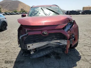 2023 Toyota RAV4 XLE with VIN 2T3W1RFV4PW267940, listed as a Copart auction lot 61827935 with 63,356 mi miles and Salvage title. Bid and sale history available at DreamBid. Image 5.