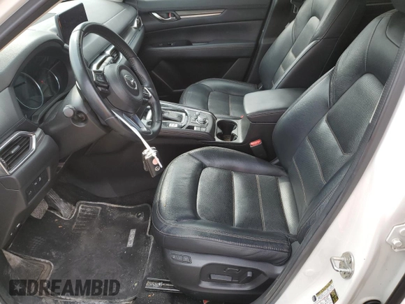 2021 Mazda CX-5 Grand Touring with VIN JM3KFBDM7M1122281, listed as a Copart auction lot 54576485 with 93,008 mi miles and Salvage Title. Bid and sale history available at DreamBid. Image 7.