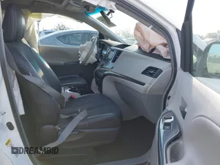 2014 Toyota Sienna SE with VIN 5TDXK3DC2ES472249, listed as a IAAI auction lot 41402101 with Not Provided miles and . Bid and sale history available at DreamBid. Image 5.