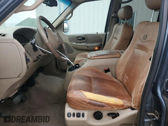 2001 Ford F-150 XLT with VIN 1FTRW07LX1KA18940, listed as a Copart auction lot 50723495 with 133,686 mi miles and Salvage title. Bid and sale history available at DreamBid. Image 7.