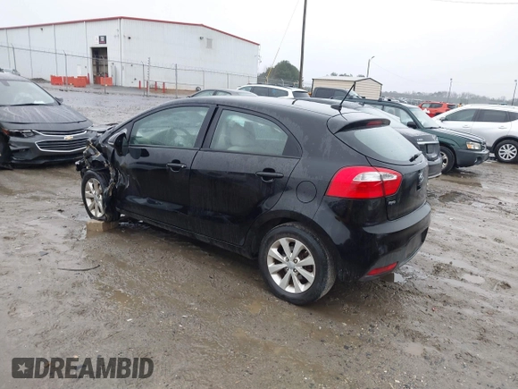 2012 Kia Rio EX with VIN KNADN5A39C6013756, listed as a IAAI auction lot 41560330 with 157,365 mi miles. Bid and sale history available at carsss.com. Image 3.
