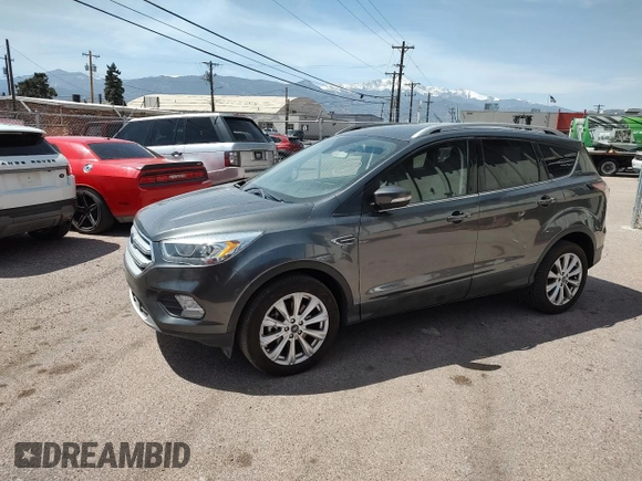 2017 Ford Escape Titanium with VIN 1FMCU9JD0HUC09357, listed as a Copart auction lot 52772915 with 99,062 mi miles and Clean Title. Bid and sale history available at carsss.com. Image 2.
