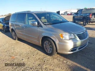2013 Chrysler Town & Country Limited with VIN 2C4RC1GG3DR716197, listed as a IAAI auction lot 41218491 with 128,158 mi miles. Bid and sale history available at carsss.com. Image 1.