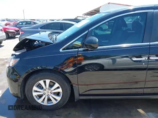 2016 Honda Odyssey EX-L with VIN 5FNRL5H61GB089853, listed as a IAAI auction lot 42019081 with 81,317 mi miles and . Bid and sale history available at DreamBid. Image 18.