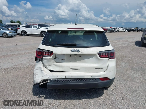 2018 Jeep Compass Sport with VIN 3C4NJCAB1JT151695, listed as a IAAI auction lot 42475636 with 77,607 mi miles and . Bid and sale history available at DreamBid. Image 16.