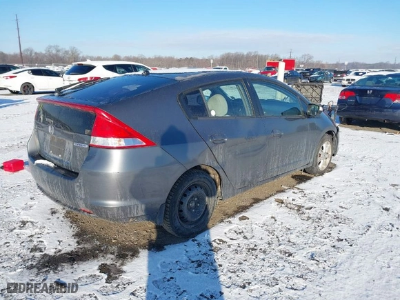 2011 Honda Insight EX with VIN JHMZE2H76BS004162, listed as a IAAI auction lot 41333373 with 287,593 mi miles. Bid and sale history available at carsss.com. Image 4.