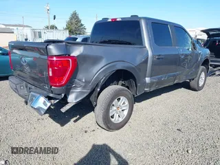 2021 Ford F-150 XL with VIN 1FTFW1E86MKD57397, listed as a IAAI auction lot 42174774 with 59,227 mi miles and . Bid and sale history available at DreamBid. Image 4.