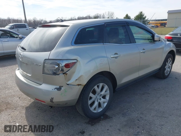 2009 Mazda CX-7 Grand Touring with VIN JM3ER29L890235402, listed as a IAAI auction lot 41834012 with 117,179 mi miles. Bid and sale history available at carsss.com. Image 4.