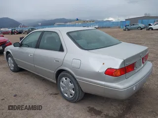 2001 Toyota Camry CE with VIN 4T1BG22K41U832610, listed as a IAAI auction lot 42010506 with 142,175 mi miles. Bid and sale history available at carsss.com. Image 3.