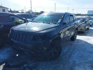 2015 Jeep Grand Cherokee Altitude with VIN 1C4RJFAG6FC724592, listed as a IAAI auction lot 41525448 with 173,306 mi miles. Bid and sale history available at carsss.com. Image 6.