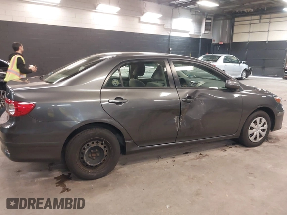 2011 Toyota Corolla L with VIN JTDBU4EE3BJ102060, listed as a IAAI auction lot 42140081 with 125,989 mi miles. Bid and sale history available at carsss.com. Image 6.