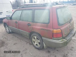 1999 Subaru Forester S with VIN JF1SF6554XH716593, listed as a IAAI auction lot 41449974 with 231,536 mi miles. Bid and sale history available at carsss.com. Image 3.