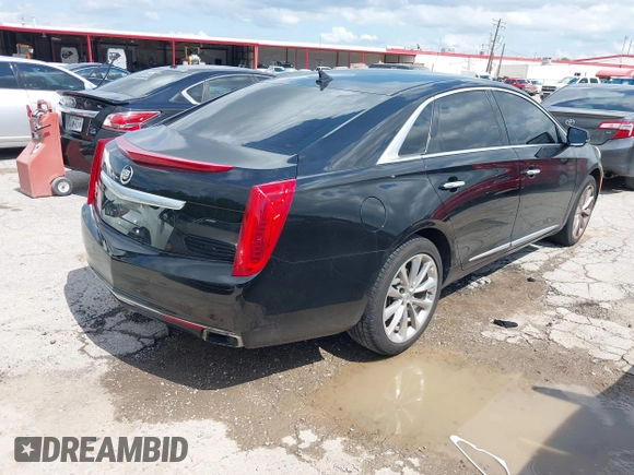 2013 Cadillac XTS Premium with VIN 2G61S5S39D9144177, listed as a IAAI auction lot 42111910 with 69,830 mi miles. Bid and sale history available at carsss.com. Image 4.
