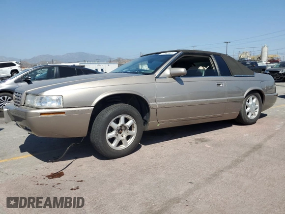 2002 Cadillac Eldorado Touring ETC z VIN 1G6ET12952B101866, wystawiony jako Copart lot #57365965 z przebiegiem Nie podano mil oraz Tytuł czysty. Historia ofert i sprzedaży dostępna na DreamBid. Obrazek 1.