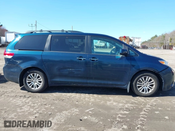 2011 Toyota Sienna XLE AAS with VIN 5TDYK3DCXBS114882, listed as a IAAI auction lot 42007417 with 144,087 mi miles and . Bid and sale history available at DreamBid. Image 14.