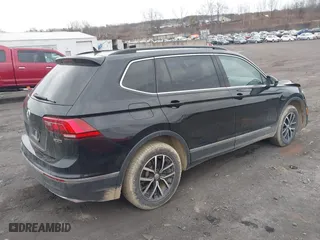 2021 Volkswagen Tiguan SE with VIN 3VV2B7AX0MM049291, listed as a IAAI auction lot 41910106 with 68,468 mi miles. Bid and sale history available at carsss.com. Image 4.