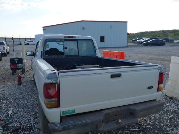 1996 Ford Ranger XLT with VIN 1FTCR14X2TPA02568, listed as a IAAI auction lot 42041567 with 239,438 mi miles. Bid and sale history available at carsss.com. Image 6.