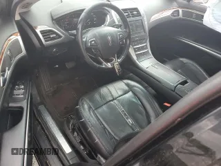 2016 Lincoln MKZ z VIN 3LN6L2GK1GR602447, wystawiony jako Copart lot #54505425 z przebiegiem 225 923 mil mil oraz Szkody całkowita. Historia ofert i sprzedaży dostępna na DreamBid. Obrazek 8.