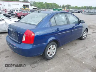 2009 Hyundai Accent Auto GLS with VIN KMHCN46C69U313921, listed as a IAAI auction lot 42011166 with 123,026 mi miles. Bid and sale history available at carsss.com. Image 4.