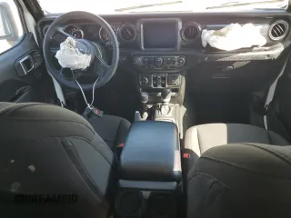 2023 Jeep Wrangler Sport Altitude with VIN 1C4HJXDG3PW623930, listed as a Copart auction lot 46733035 with 26,032 mi miles and Salvage Title. Bid and sale history available at DreamBid. Image 8.
