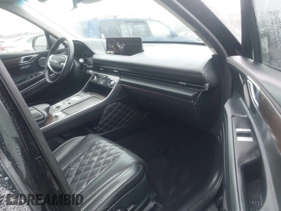 2022 Genesis GV80 with VIN KMUHCESC0NU083778, listed as a IAAI auction lot 41553215 with 93,384 mi miles and . Bid and sale history available at DreamBid. Image 5.