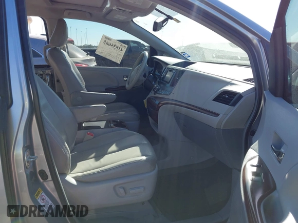 2014 Toyota Sienna XLE with VIN 5TDYK3DC7ES447903, listed as a IAAI auction lot 41835665 with 224,492 mi miles. Bid and sale history available at carsss.com. Image 5.