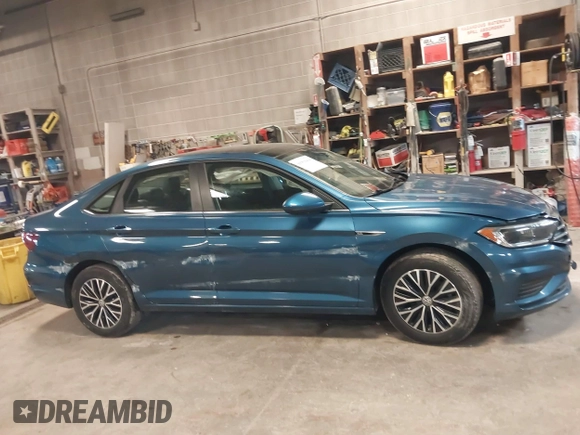 2019 Volkswagen Jetta SEL z VIN 3VWE57BU2KM116717, wystawiony jako IAAI lot #41951428 z przebiegiem 85 791 mil mil oraz . Historia ofert i sprzedaży dostępna na DreamBid. Obrazek 13.