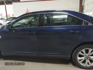 2011 Ford Taurus SEL with VIN 1FAHP2EW7BG174493, listed as a IAAI auction lot 41697856 with 143,957 mi miles. Bid and sale history available at carsss.com. Image 14.