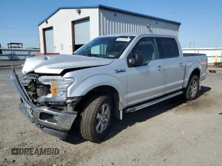 2018 Ford F-150 XL with VIN 1FTEW1EG4JKD58403, listed as a Copart auction lot 64187475 with 97,709 mi miles and Salvage title. Bid and sale history available at DreamBid. Image 1.