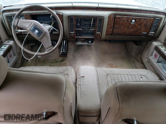 1992 Cadillac Brougham z VIN 1G6DW5479NR710170, wystawiony jako Copart lot #70194164 z przebiegiem Nie podano mil oraz Nie do naprawy • Non repairable. Historia ofert i sprzedaży dostępna na DreamBid. Obrazek 8.