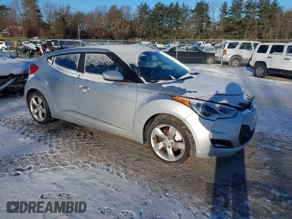 2012 Hyundai Veloster w/Gray Int with VIN KMHTC6AD0CU034568, listed as a IAAI auction lot 41460659 with 141,826 mi miles and . Bid and sale history available at DreamBid. Image 1.