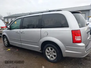 2010 Chrysler Town & Country Touring with VIN 2A4RR5D14AR293299, listed as a IAAI auction lot 41184584 with 245,928 mi miles. Bid and sale history available at carsss.com. Image 14.
