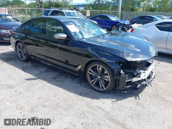 2019 BMW 5 Series M550i xDrive with VIN WBAJB9C51KB289355, listed as a IAAI auction lot 41867984 with 30,106 mi miles and . Bid and sale history available at DreamBid. Image 1.