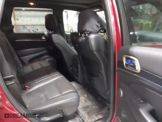 2014 Jeep Grand Cherokee Summit with VIN 1C4RJFJT4EC308729, listed as a IAAI auction lot 41694212 with 175,654 mi miles. Bid and sale history available at carsss.com. Image 8.