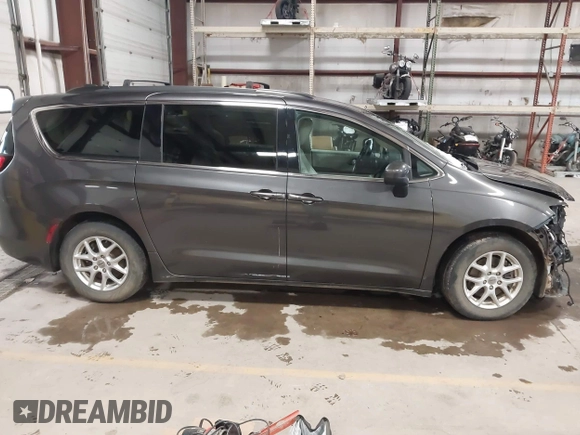2021 Chrysler Voyager LXi with VIN 2C4RC1DG3MR551692, listed as a IAAI auction lot 41855081 with 131,625 mi miles and . Bid and sale history available at DreamBid. Image 14.