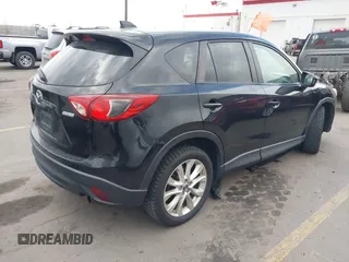 2013 Mazda CX-5 Grand Touring with VIN JM3KE4DEXD0154638, listed as a IAAI auction lot 41528944 with 195,159 mi miles. Bid and sale history available at carsss.com. Image 4.