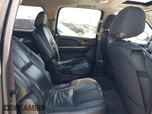 2011 Chevrolet Suburban LT with VIN 1GNSCJE09BR235355, listed as a IAAI auction lot 42030105 with 308,576 mi miles. Bid and sale history available at carsss.com. Image 8.