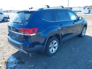 2018 Volkswagen Atlas SE with VIN 1V2DP2CA6JC592774, listed as a IAAI auction lot 41389952 with 58,546 mi miles and . Bid and sale history available at DreamBid. Image 4.