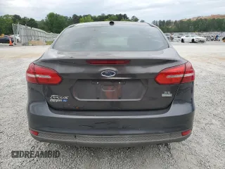 2018 Ford Focus SE z VIN 1FADP3FE1JL220741, wystawiony jako Copart lot #53755735 z przebiegiem Nie podano mil oraz Czysty tytuł • Clean title. Historia ofert i sprzedaży dostępna na DreamBid. Obrazek 6.