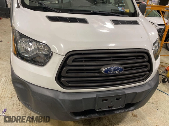 2016 Ford Transit z VIN 1FTYR1YM4GKB55543, wystawiony jako IAAI lot #42504585 z przebiegiem 104 991 mil mil oraz . Historia ofert i sprzedaży dostępna na DreamBid. Obrazek 21.