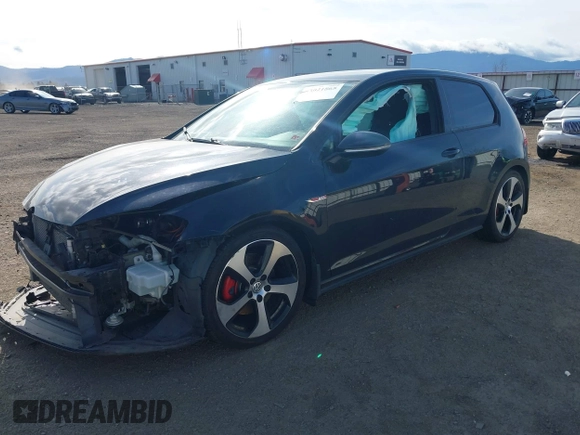 2015 Volkswagen Golf GTI S with VIN 3VWYT7AUXFM088823, listed as a IAAI auction lot 42021865 with 90,976 mi miles. Bid and sale history available at carsss.com. Image 2.